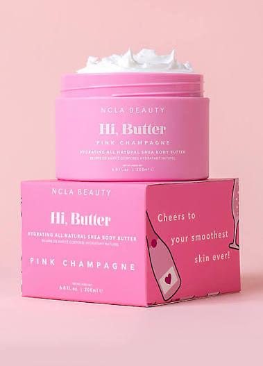 Pink NCLA Beauty 'Hi. Butter' product with packaging on a pink background